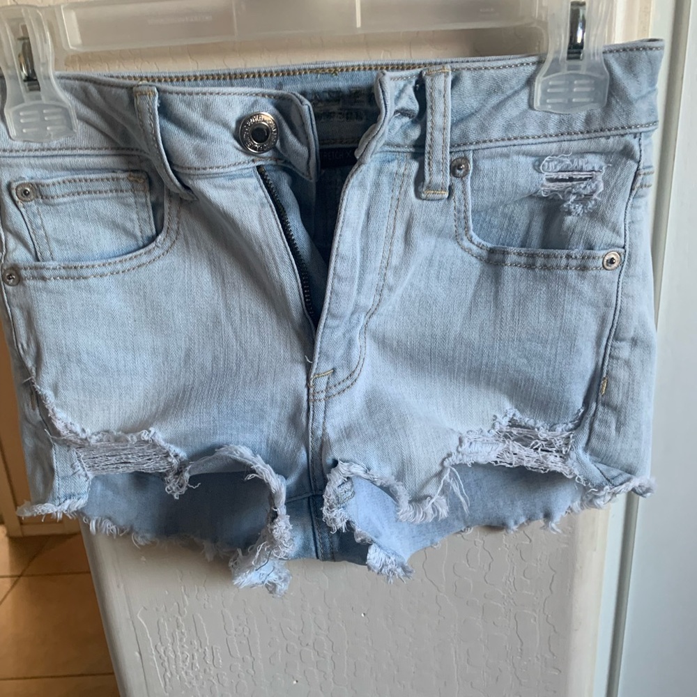 AE distressed blue jean shorts. Super stretchy size 2